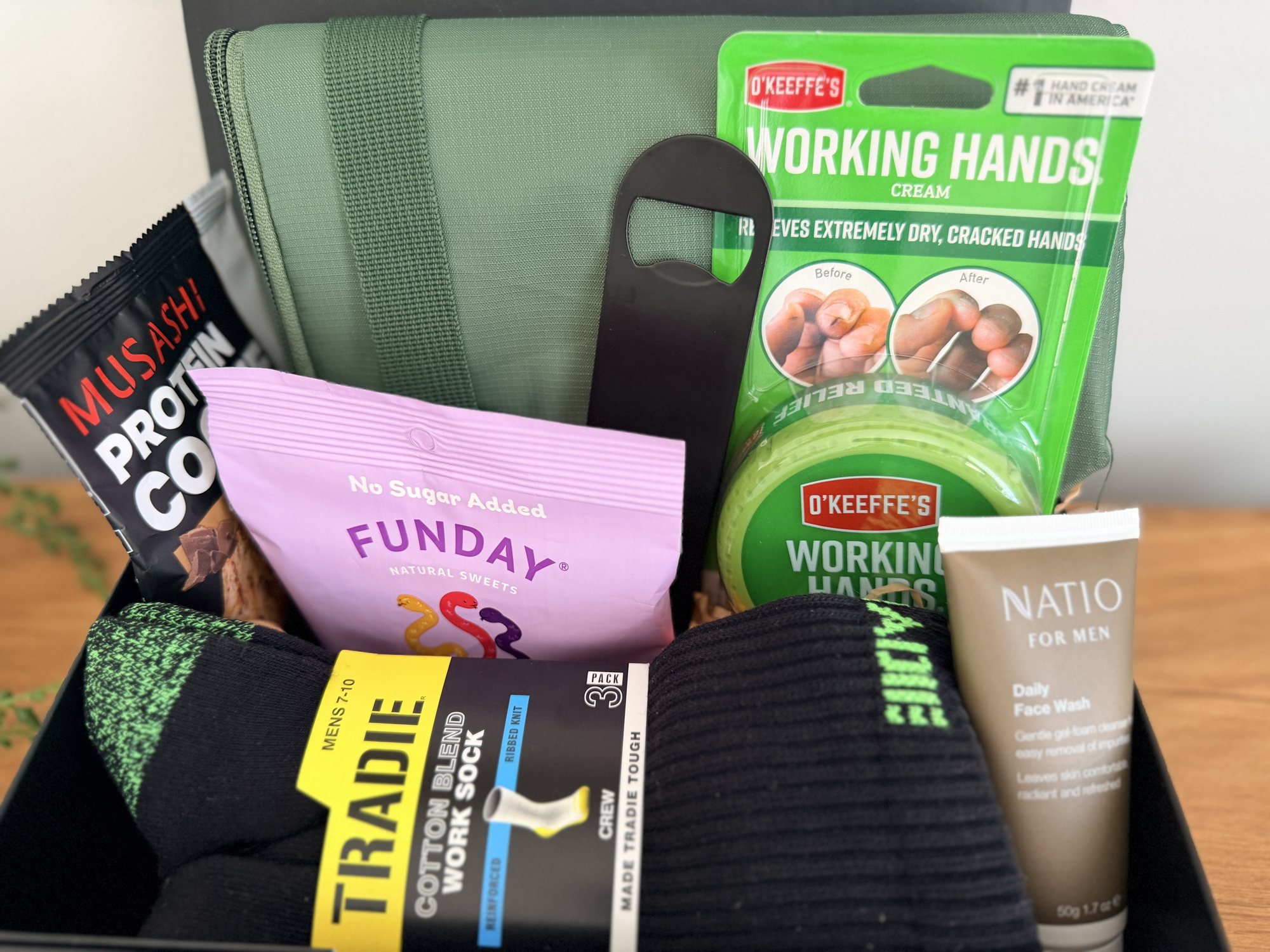 The Toolbelt Hamper packed open, showing all the gear inside