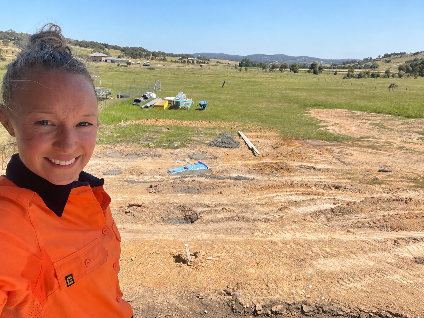 Jacki in hi-vis on a construction site