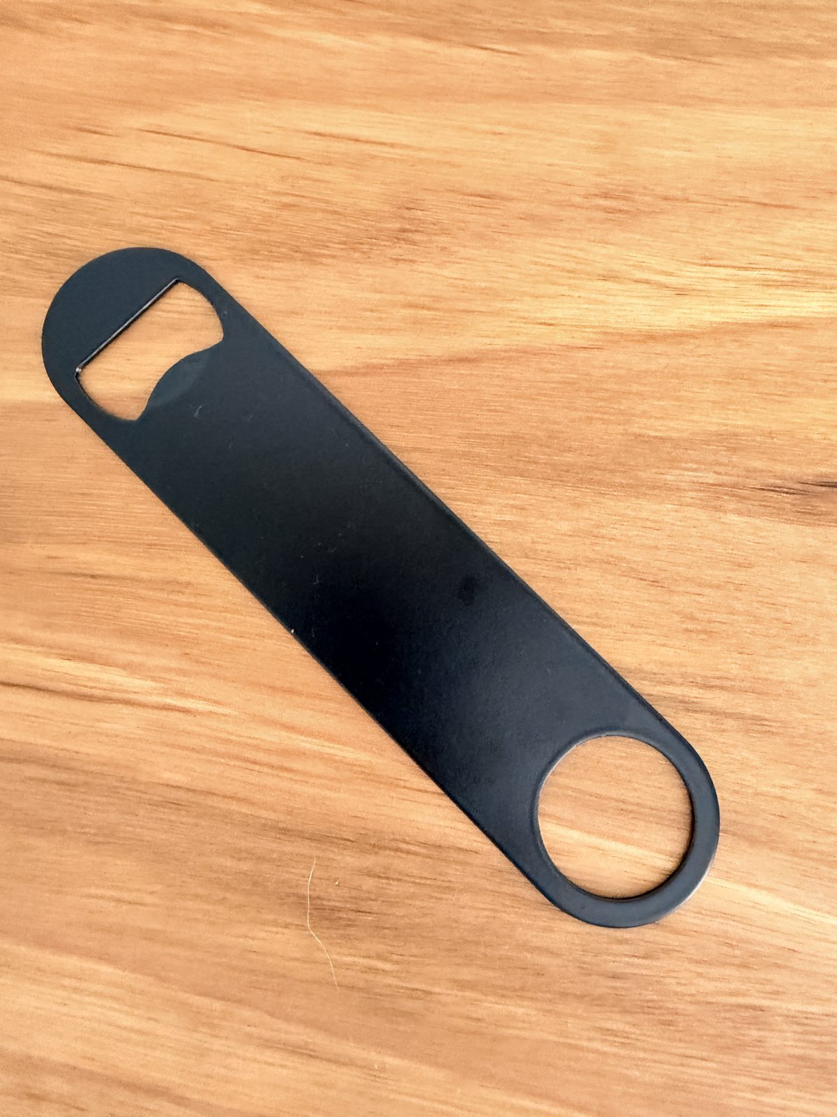 Heavy duty black bar-blade bottle opener